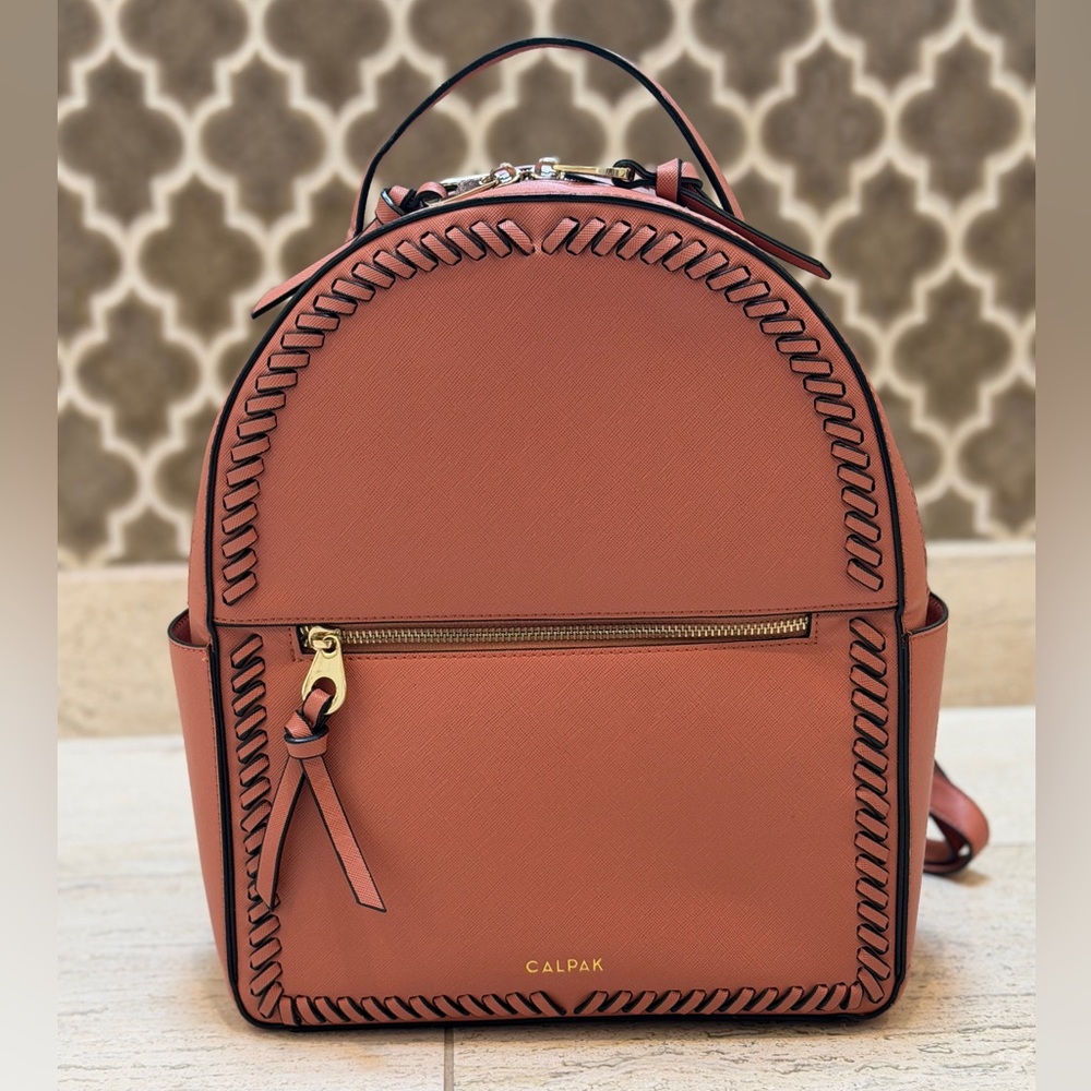 Calpak Kaya Backpack in dusty rose with gold hardware